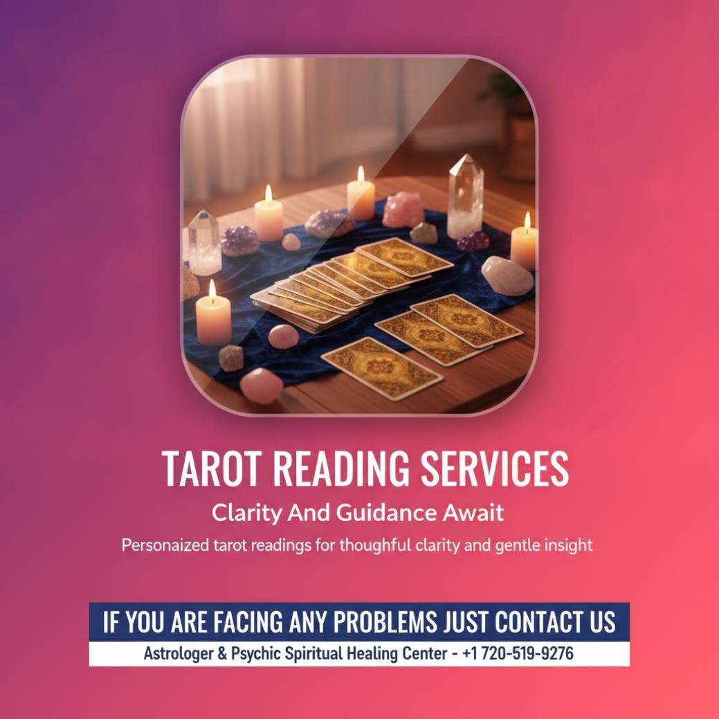 Spreading of tarot cards on a blue cloth with candles in Denver, CO